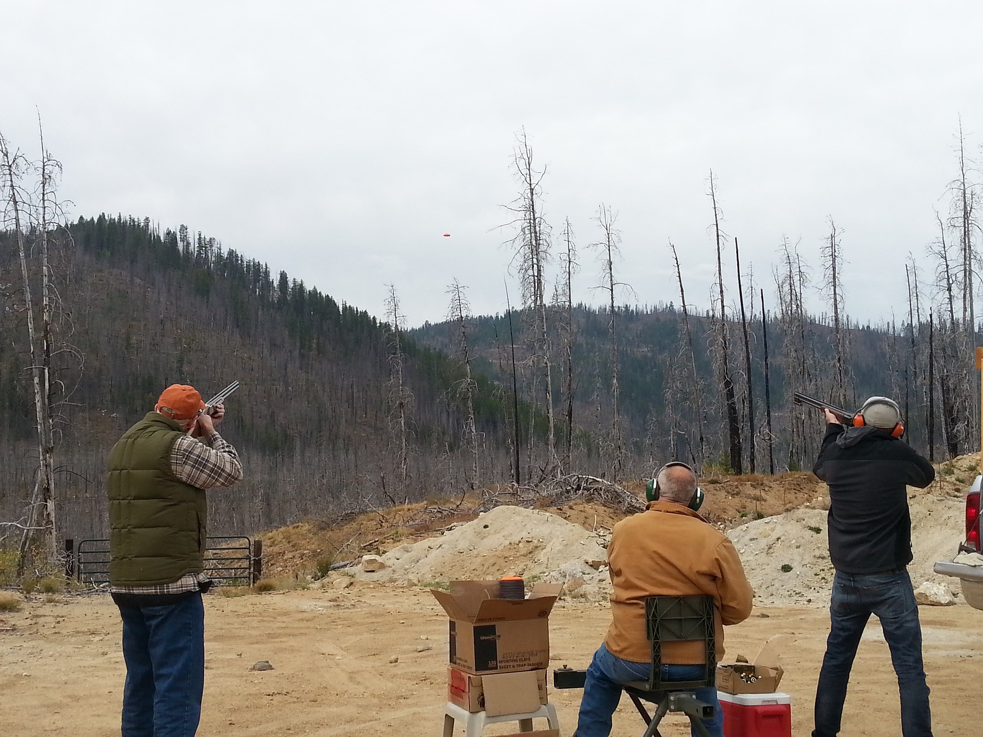 People shooting clay pigeons